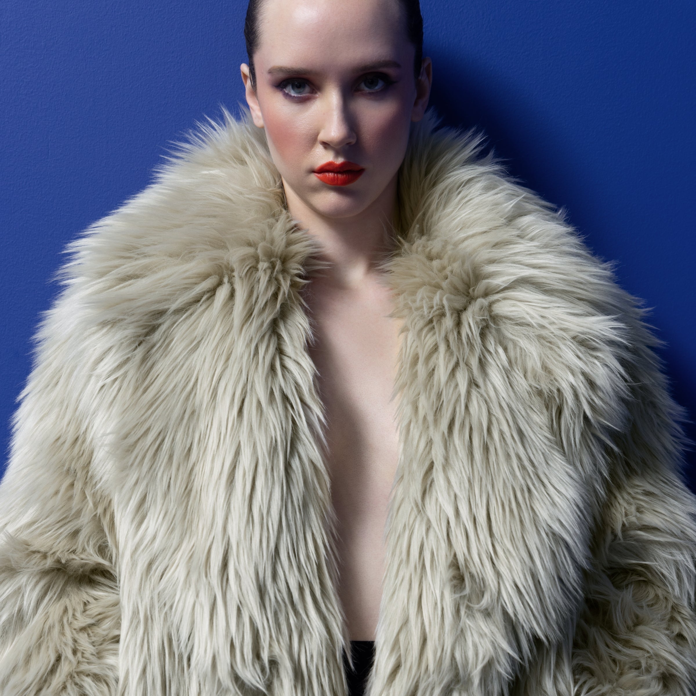 Woman wearing St John Knits Resort 2025 faux fur coat