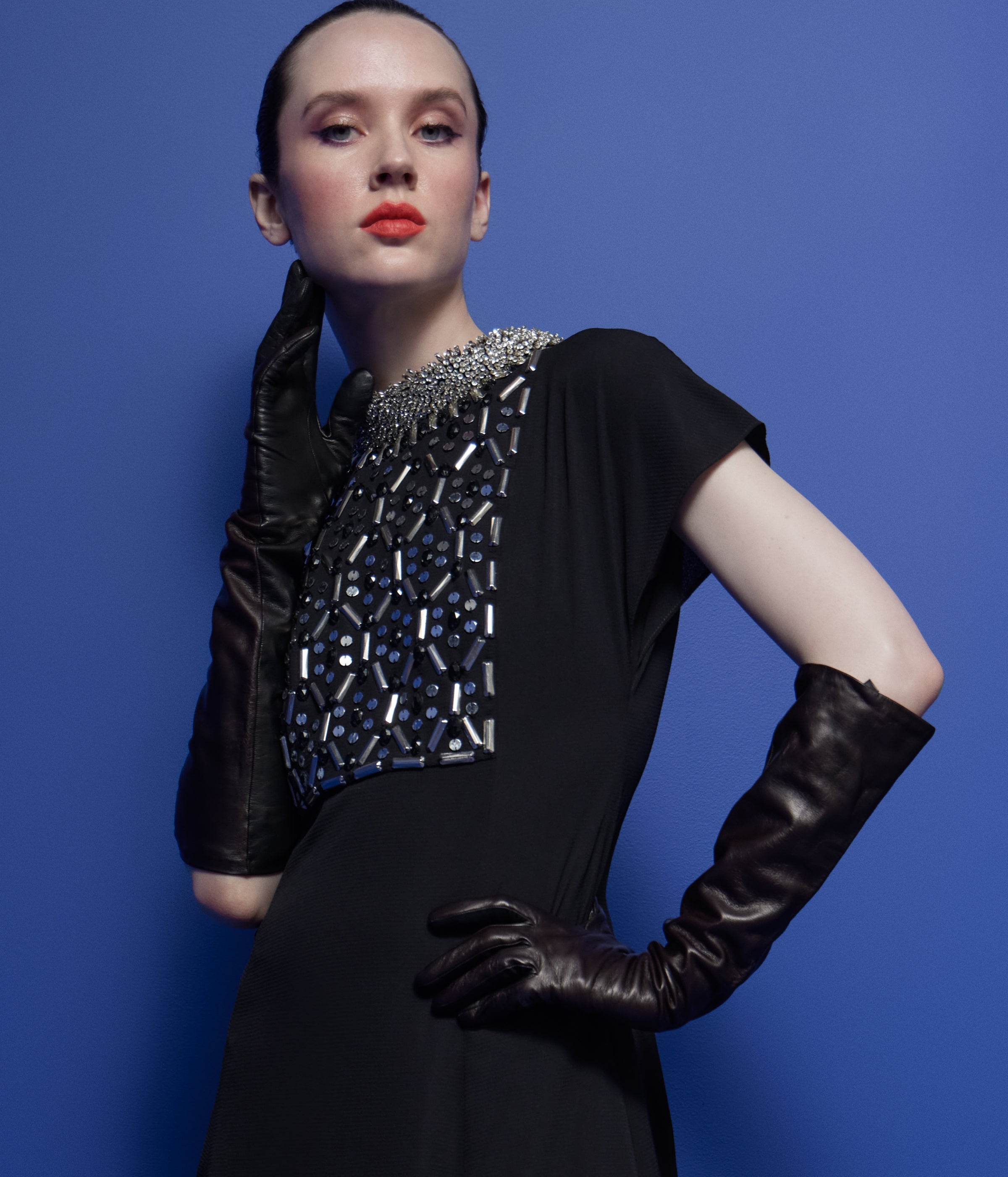 woman wearing St John Knits Resort 2025 Dess in black with sequin details in front